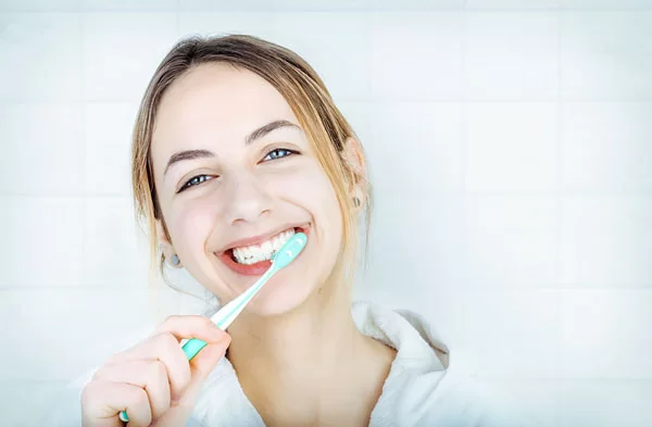 brushing teeth after dental treatment for optimal oral health